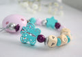 Personalised Wooden Dummy Clip – Turquoise Butterfly- Teething Chain
